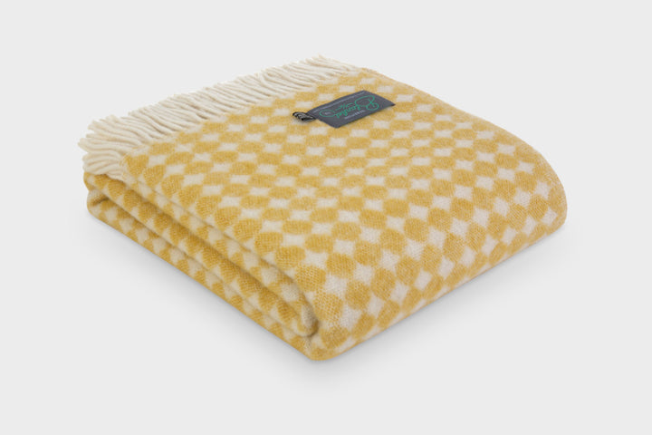 folded yellow spot wool throw blanket by The British Blanket Company online shop