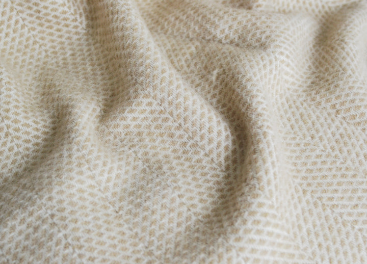 Closeup of beige beehive wool throw