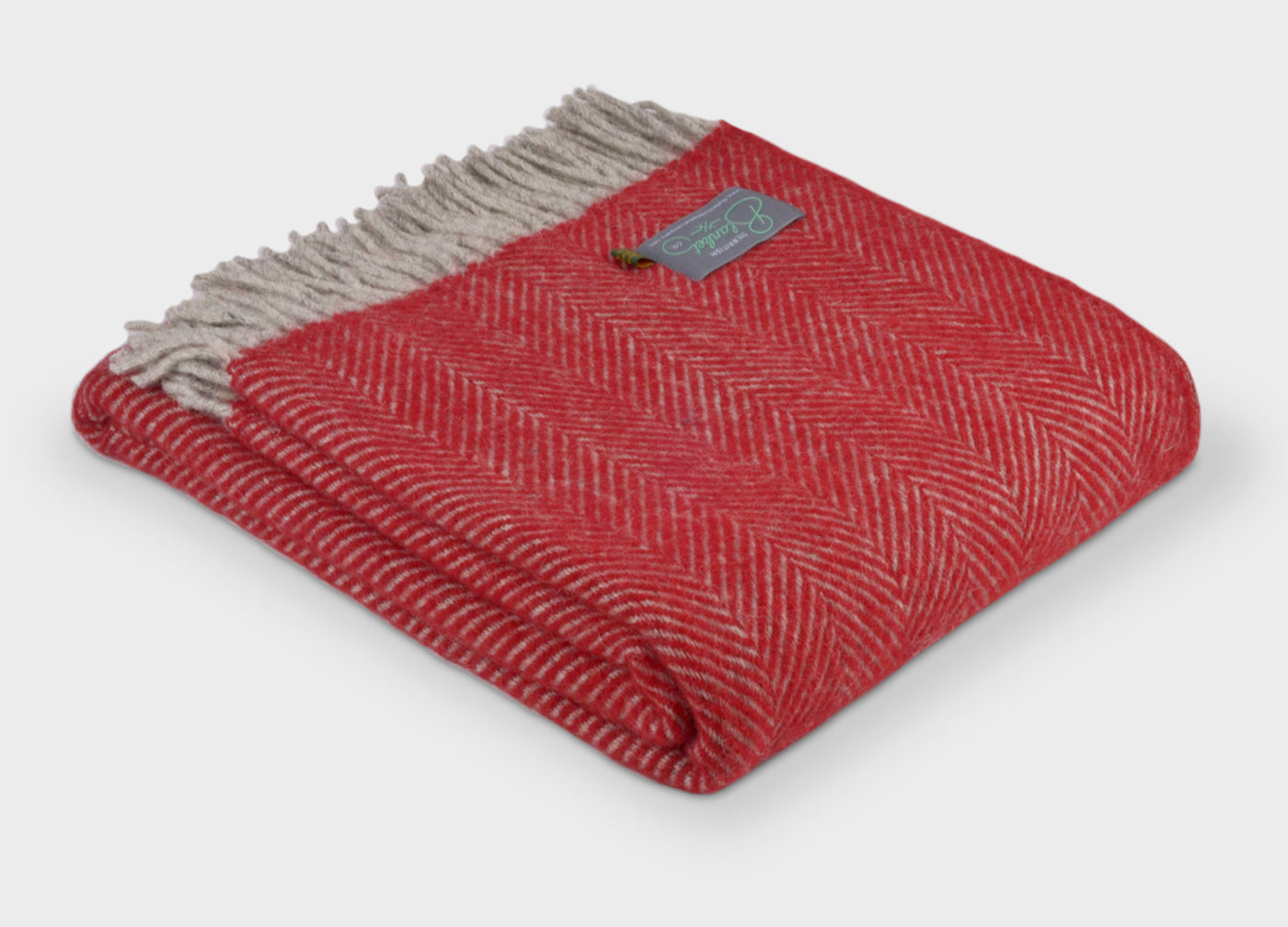 Folded large red and grey herringbone wool throw by The British Blanket Company